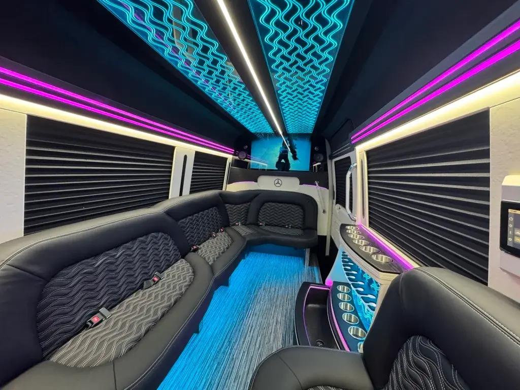 Interior of a Deluxe Sprinter limousine with wraparound seating
